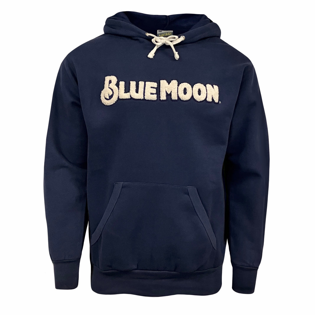 Navy hooded sweatshirt with a front pocket and large cream textured “BLUE MOON” text across the chest.