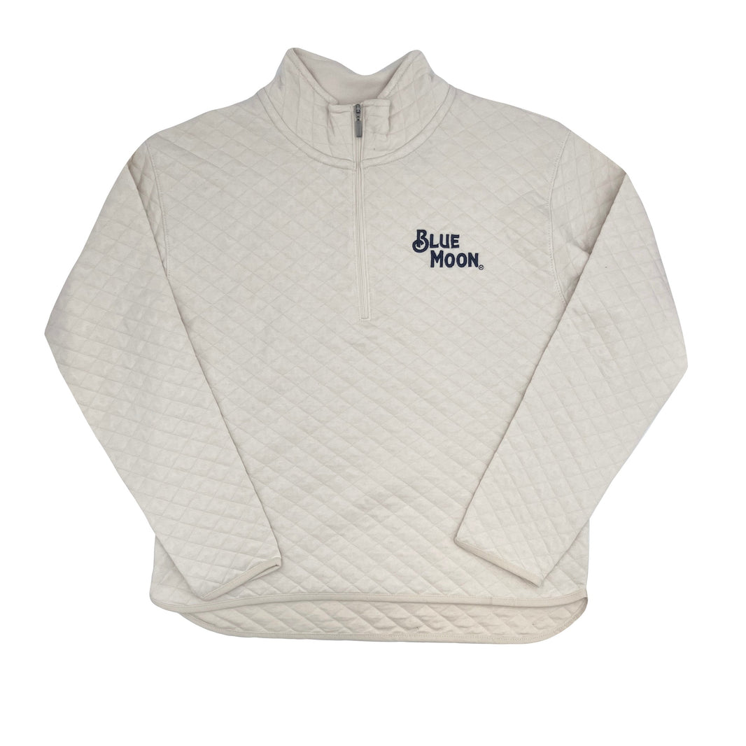 Cream quilted quarter‑zip pullover with “BLUE MOON.” embroidered in navy on the upper left chest.