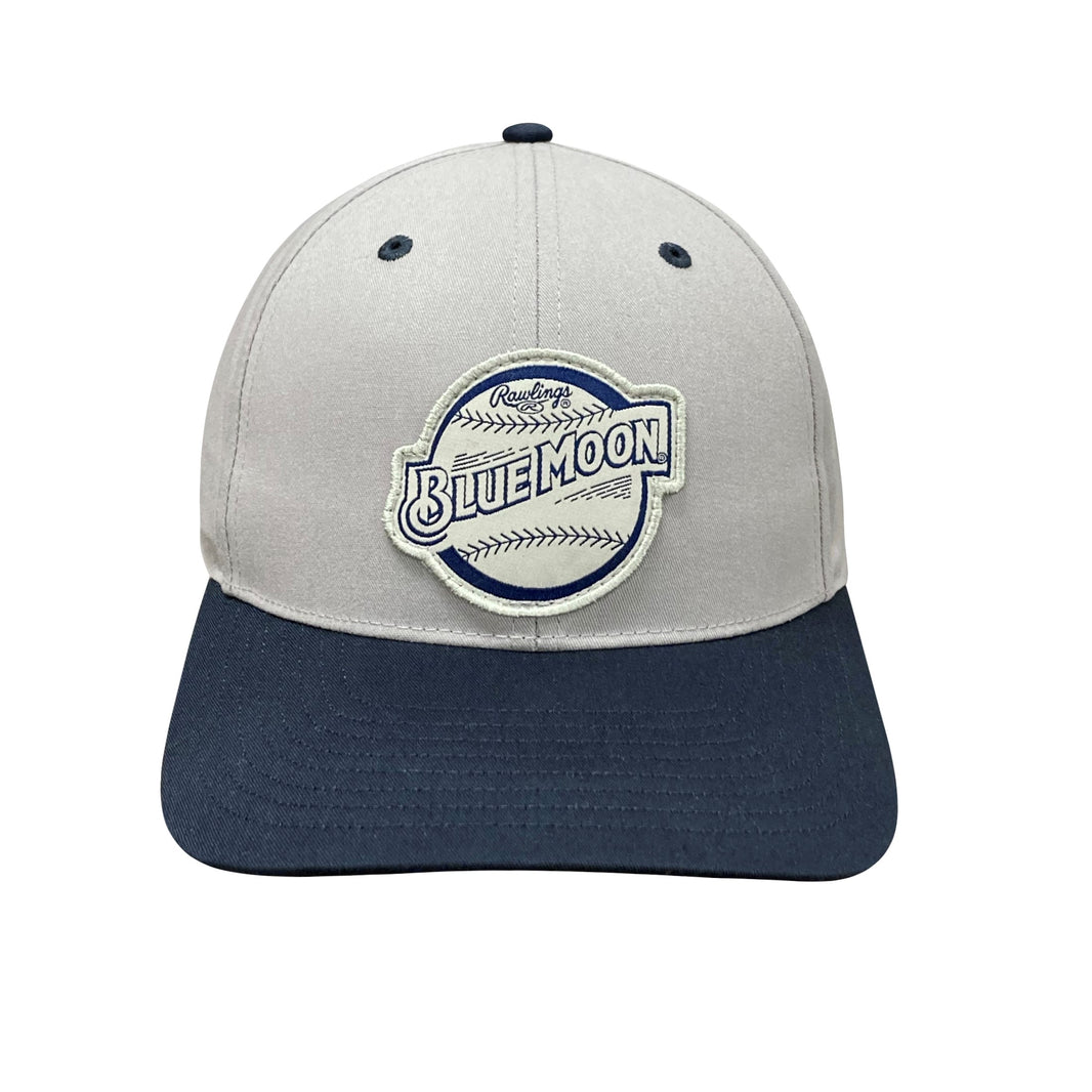 Light gray baseball cap front with a navy brim and a front patch reading “BLUE MOON” with baseball-style stitching details.