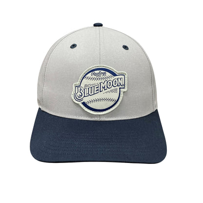 Light gray baseball cap front with a navy brim and a front patch reading “BLUE MOON” with baseball-style stitching details.
