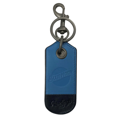 Blue and navy leather keychain with embossed Blue Moon logo and metal clip and keyring at the top.