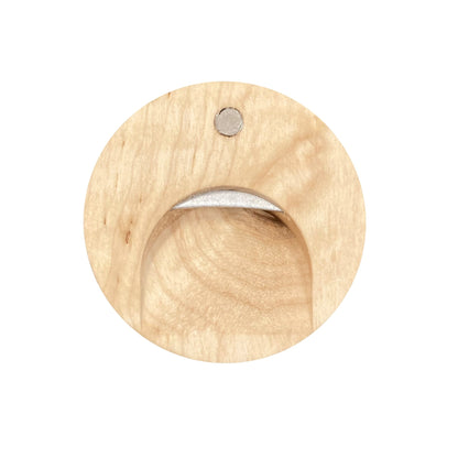 Round light wood bottle back opener with a metal opener inset near the bottom and a small round magnet at the top.